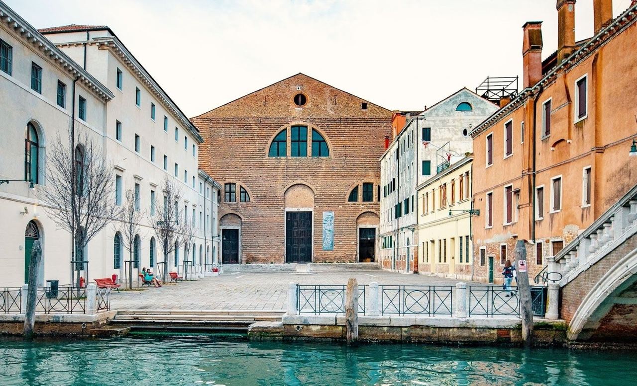 The brick front of the church of San Lorenzo, home of Ocean Space, across its canal